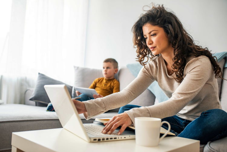 Woman, child and computer