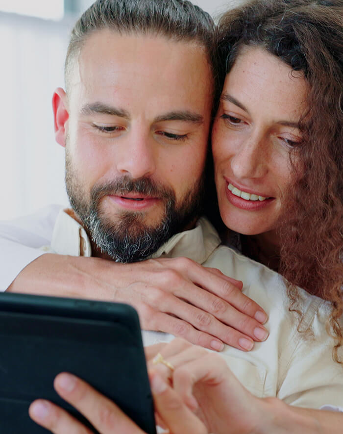 Man looks at finance spreadsheet